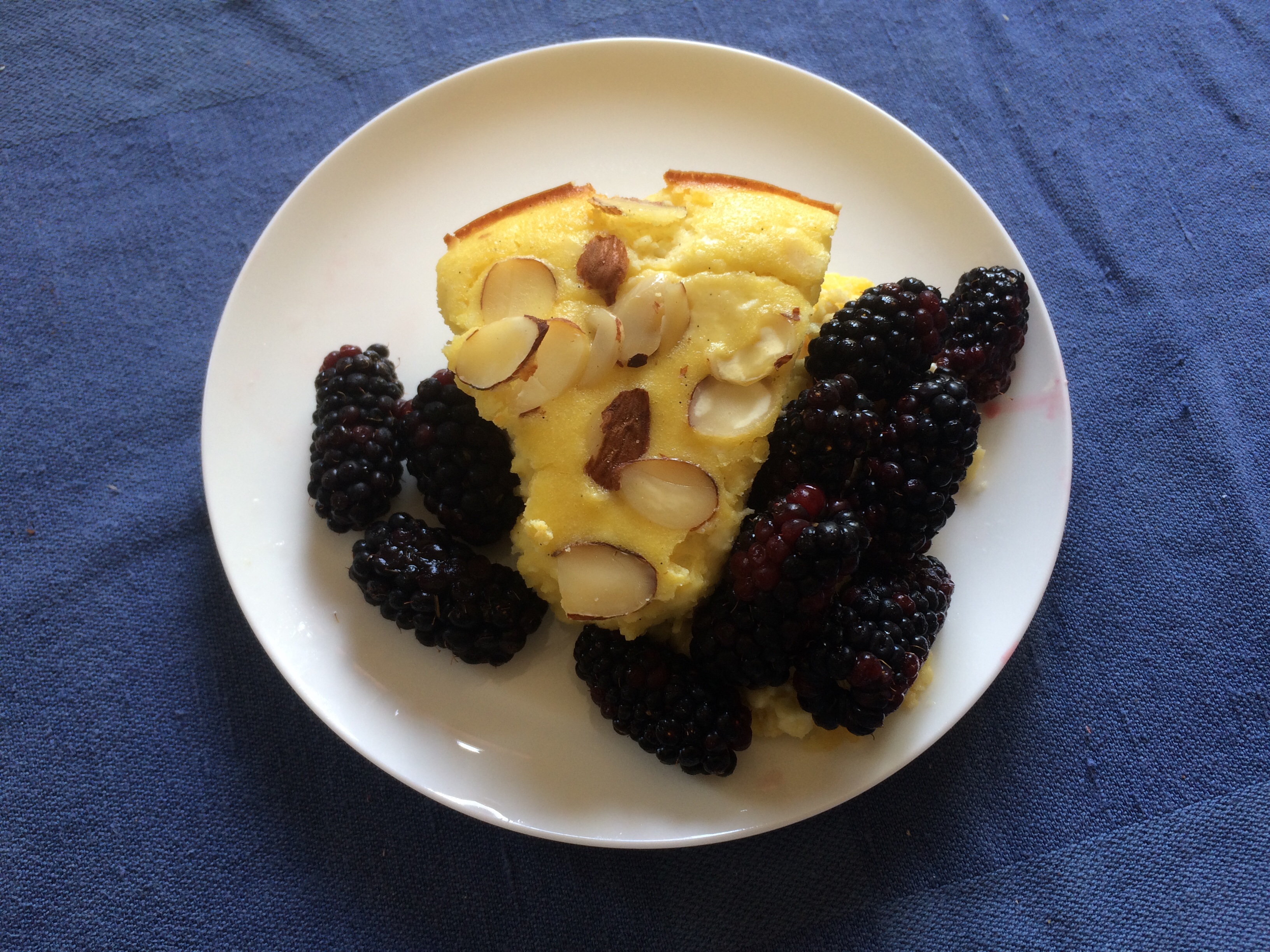 Curd cake and boysenberries